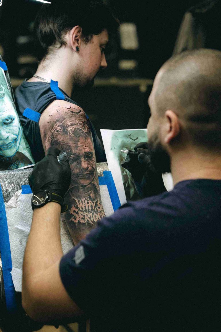 pikass tattoo termin realistic portrait oberarm